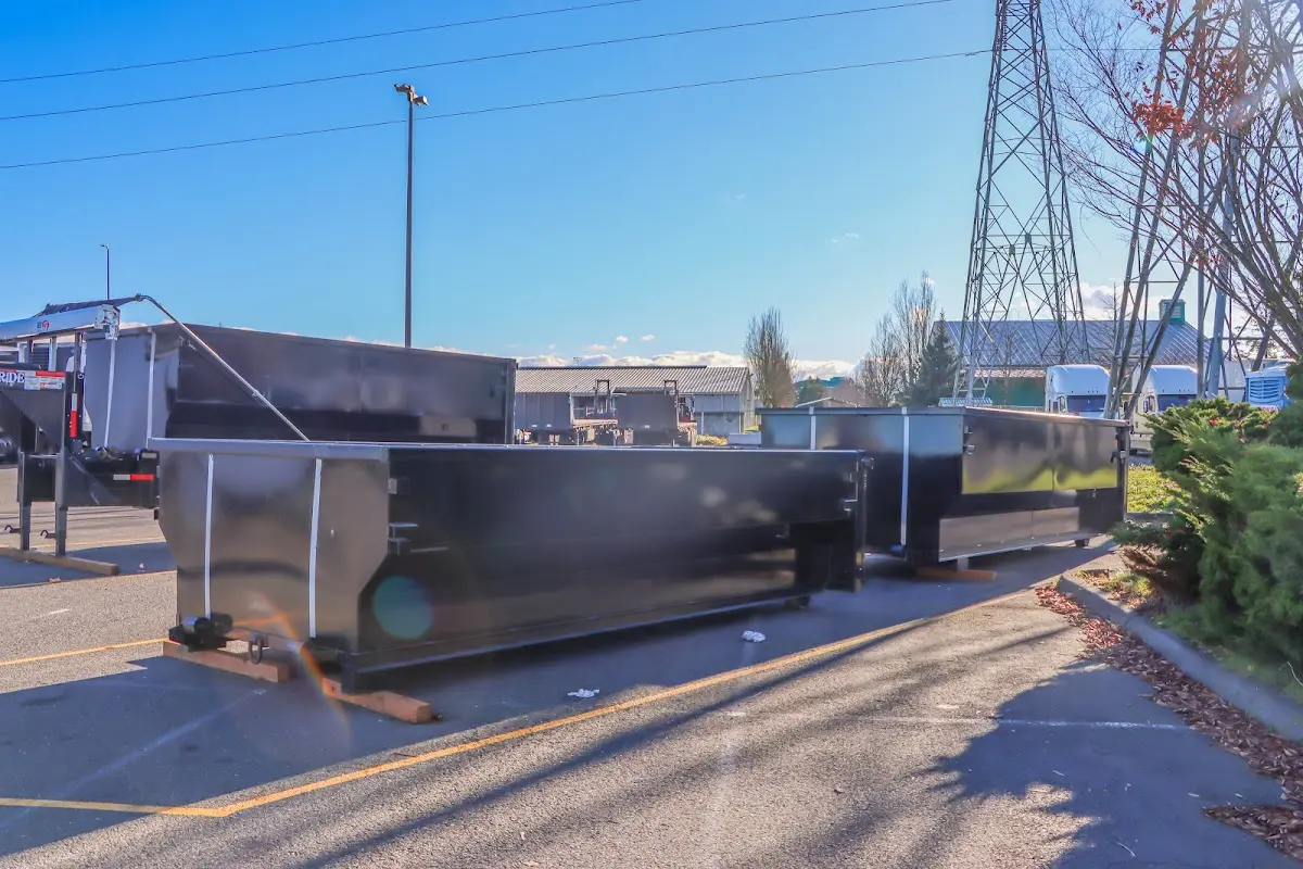 Roll-off dumpster ready for waste disposal at job site for Concrete Dumpster Rental in Cedar Park